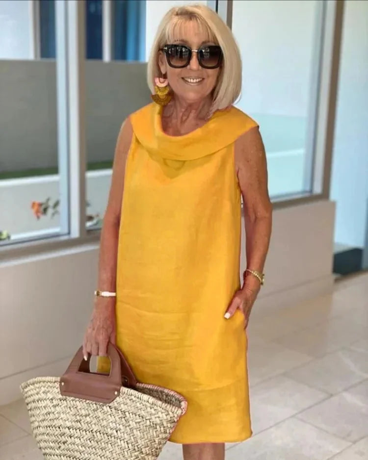LOUISE -Elegantna haljina bez rukava s uskim krojem i laskavom siluetom