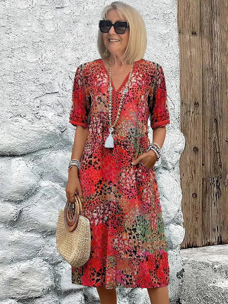 Anthea - Elegantna cvjetna midi haljina