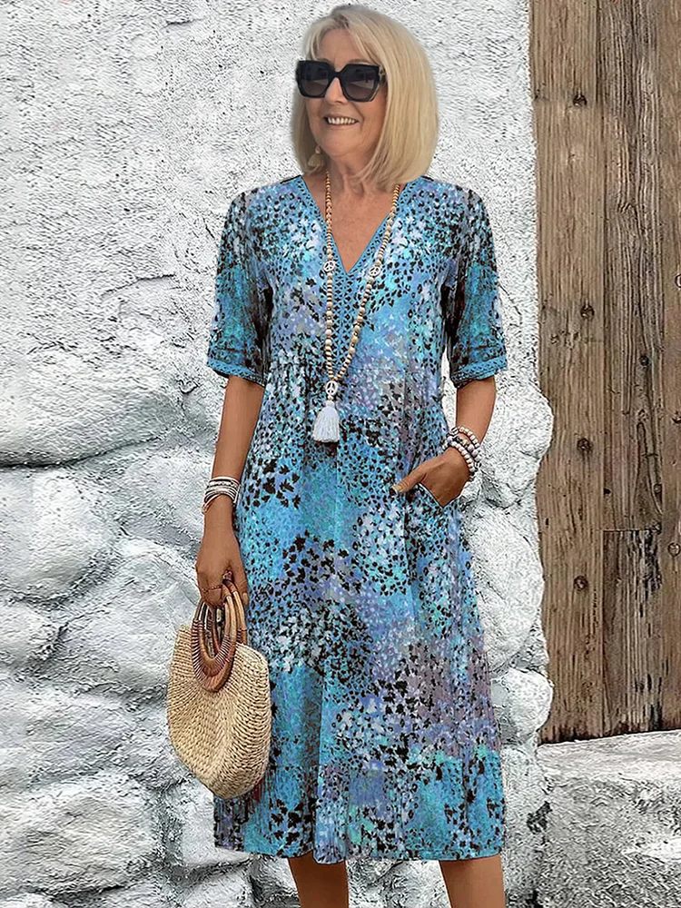 Anthea - Elegantna cvjetna midi haljina